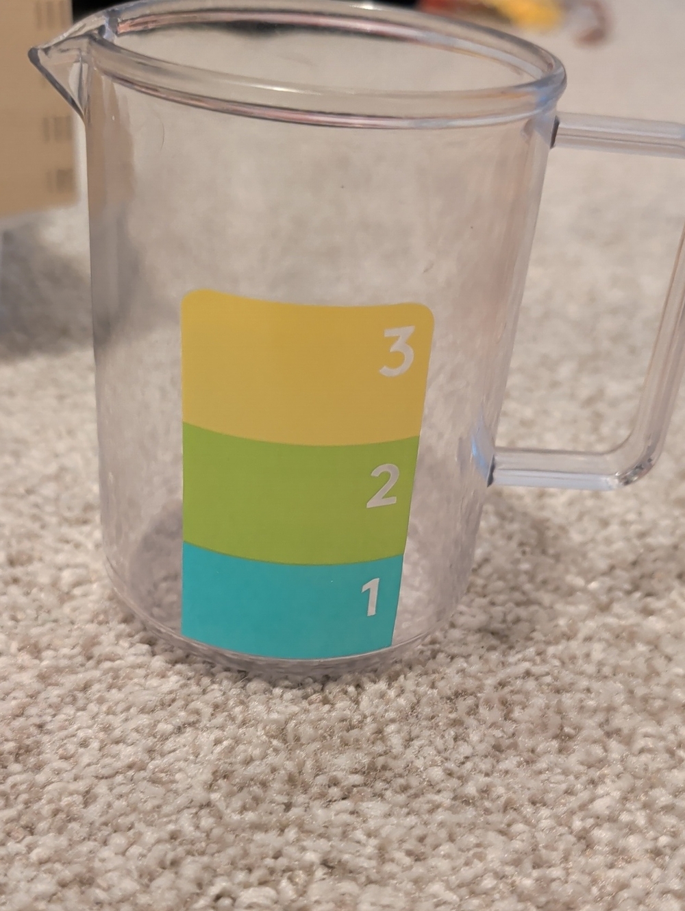 Lovevery Clear Plastic Measuring Cup with Color-Coded Levels - Yellow/Green/Blue